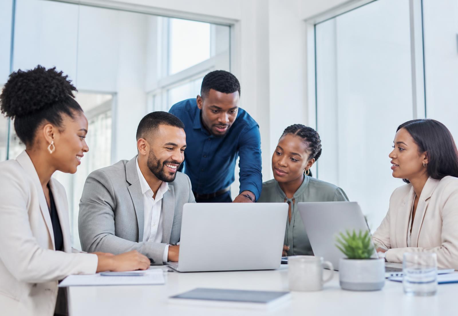 Connected team collaborating in a modern South African workspace
